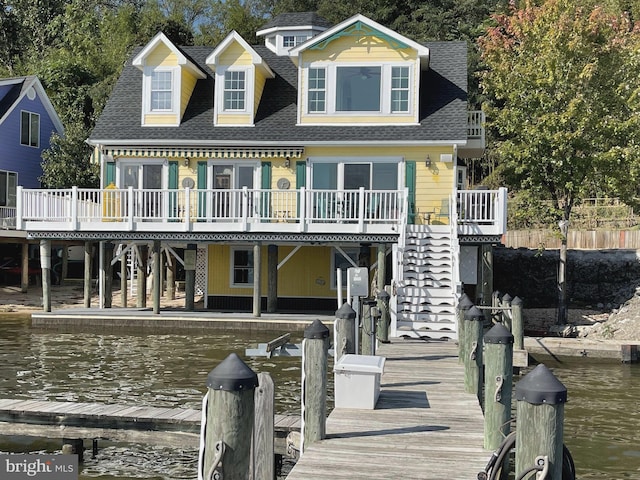 16254 Neabsco Beach Way, Woodbridge, VA 22191 - back of property with a deck with water view, roof with shingles, and stairway