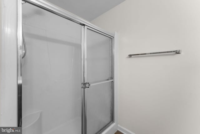 full bathroom with a shower stall