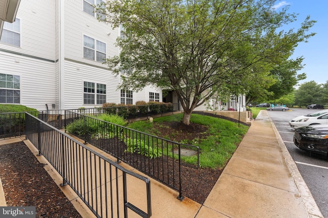 surrounding community featuring fence