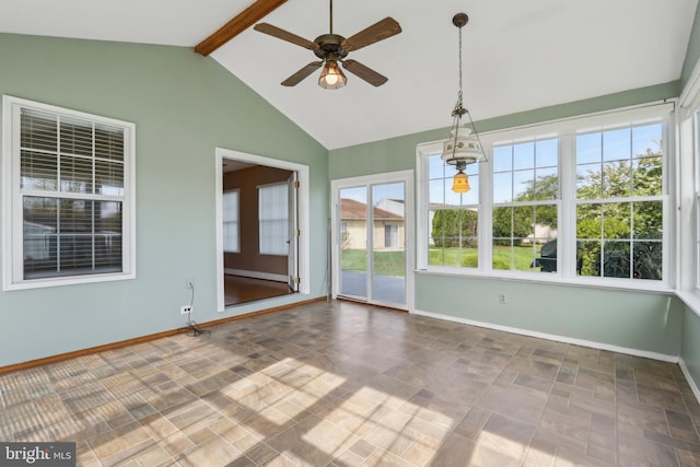 unfurnished sunroom featuring lofted ceiling with beams and baseboards