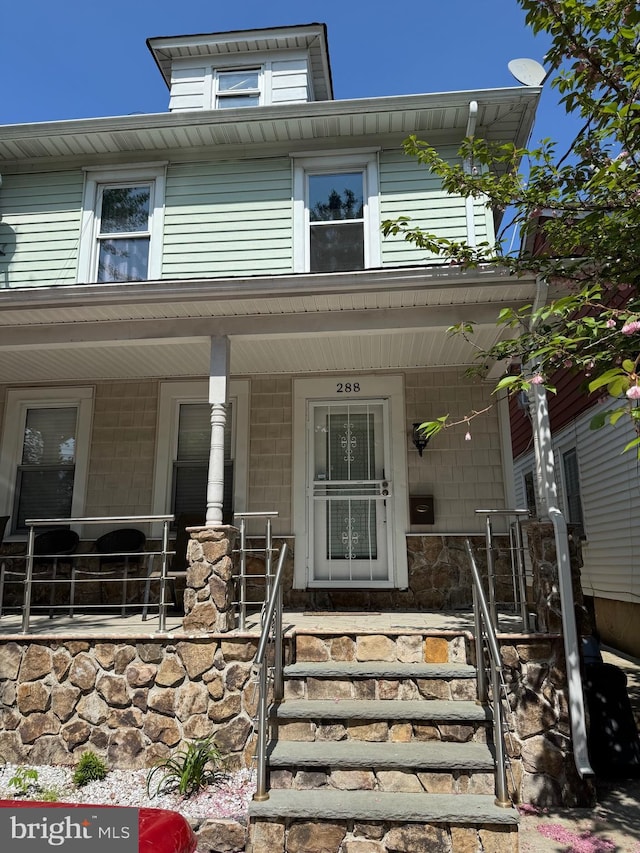 view of front of home with covered porch