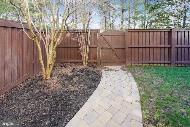 21417 Falling Rock Ter, Broadlands, VA 20148 - fenced backyard featuring a gate