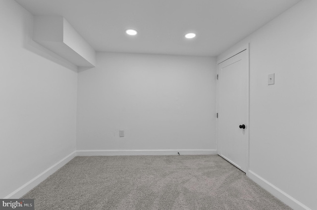 interior space with carpet, recessed lighting, and baseboards