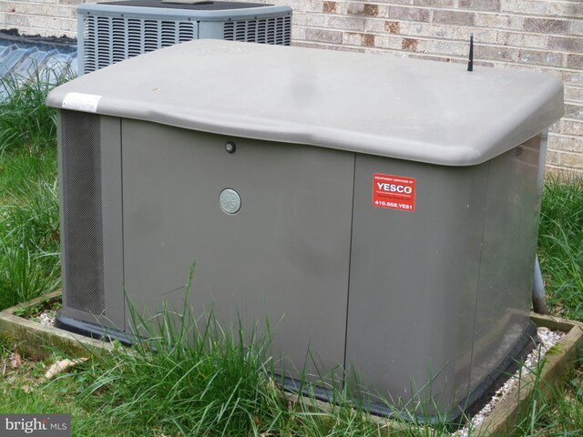 exterior details with central air condition unit and a power unit