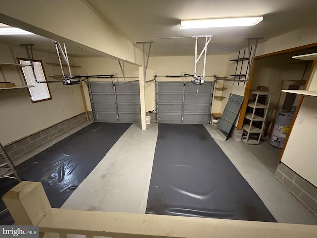 29 Salt Grass Rd, Ocean Pines, MD 21811 - garage featuring a garage door opener and water heater