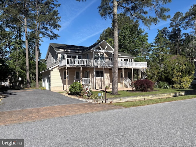 29 Salt Grass Rd, Ocean Pines, MD 21811 - townhome / multi-family property with asphalt driveway, a garage, and a deck
