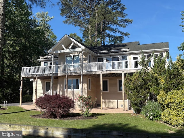 29 Salt Grass Rd, Ocean Pines, MD 21811 - rear view of property with a wooden deck and a yard