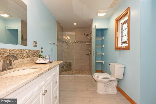 29 Salt Grass Rd, Ocean Pines, MD 21811 - bathroom with toilet, vanity, tiled shower, and decorative backsplash