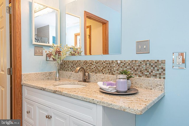 29 Salt Grass Rd, Ocean Pines, MD 21811 - bathroom featuring backsplash and vanity
