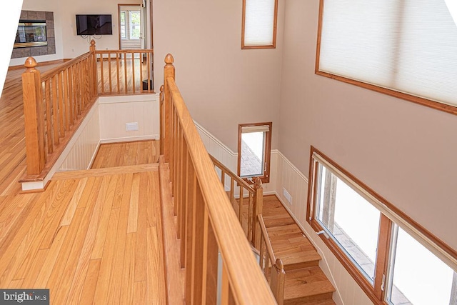 29 Salt Grass Rd, Ocean Pines, MD 21811 - staircase featuring wood finished floors and wainscoting