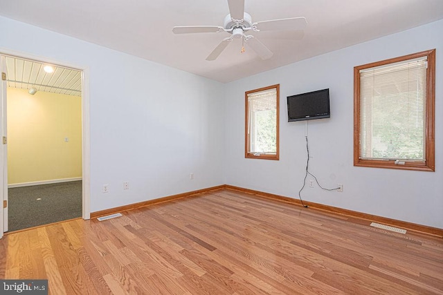 29 Salt Grass Rd, Ocean Pines, MD 21811 - unfurnished room with light wood-style floors, baseboards, and ceiling fan
