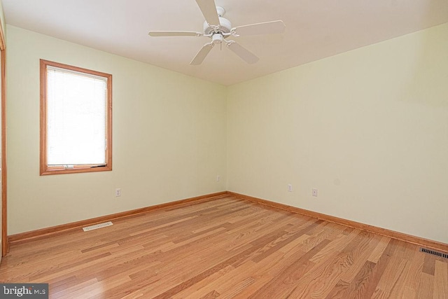 29 Salt Grass Rd, Ocean Pines, MD 21811 - spare room with light wood-type flooring, baseboards, and ceiling fan