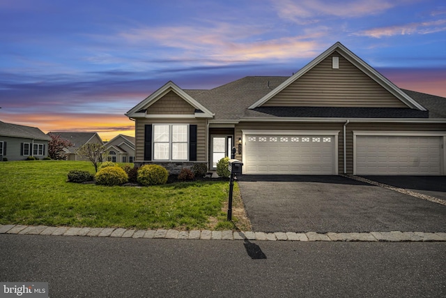 323 Valor Dr, Mechanicsburg, PA 17050 - view of front of house featuring roof with shingles, an attached garage, driveway, and a front yard