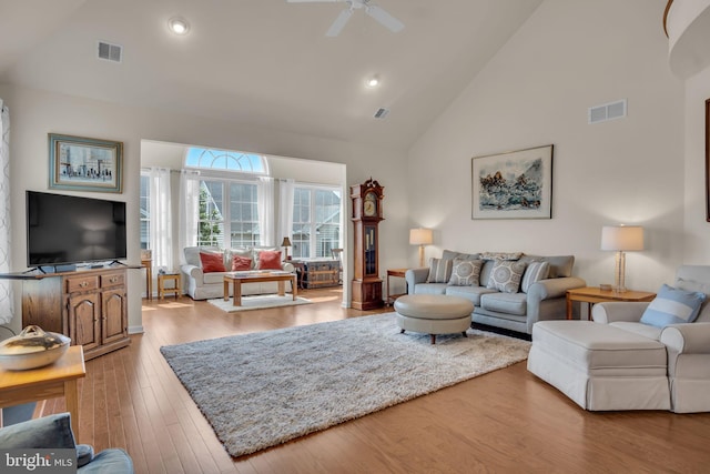 323 Valor Dr, Mechanicsburg, PA 17050 - living room with high vaulted ceiling, ceiling fan, wood finished floors, and visible vents