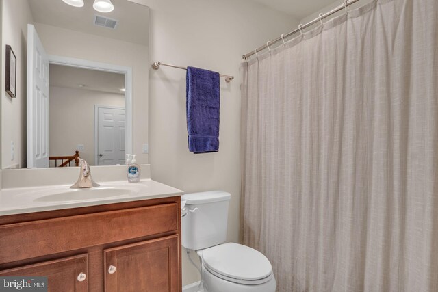 323 Valor Dr, Mechanicsburg, PA 17050 - bathroom featuring visible vents, toilet, and vanity