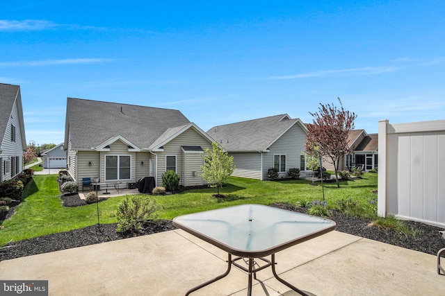 323 Valor Dr, Mechanicsburg, PA 17050 - rear view of property featuring a patio and a lawn