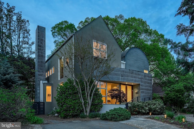view of front of house with a chimney