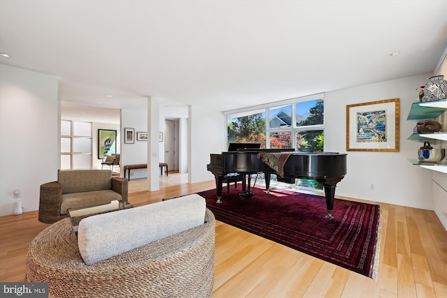 sitting room featuring wood finished floors