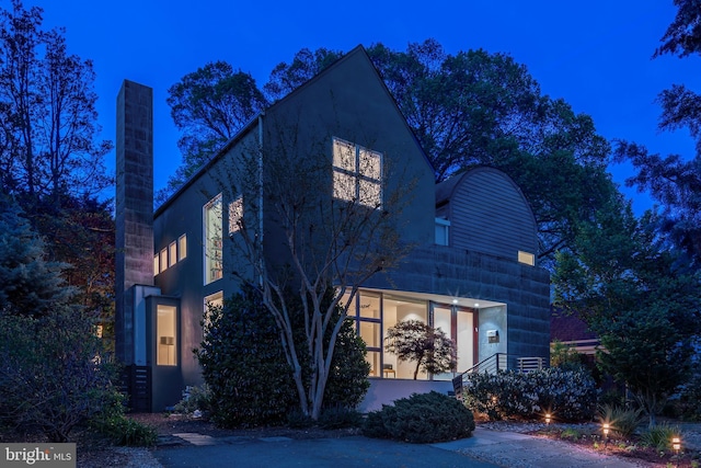 view of front of property featuring a chimney