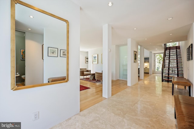 corridor with recessed lighting