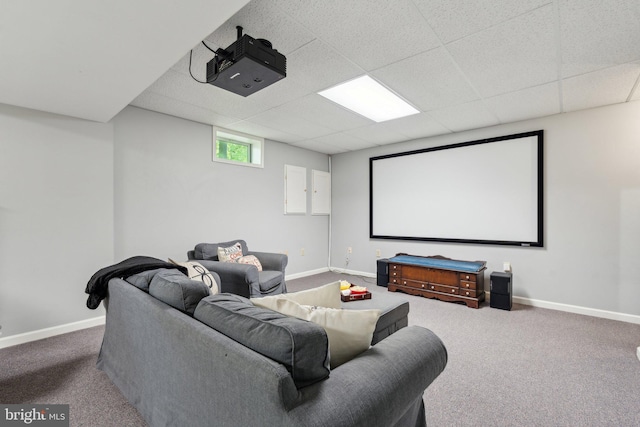 13109 Crestbrook Dr, Manassas, VA 20112 - home theater room featuring carpet floors, baseboards, and a paneled ceiling