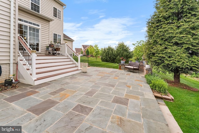 view of patio featuring stairway