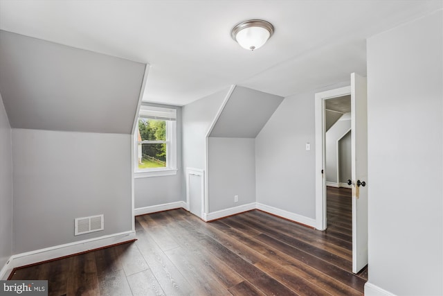 5218 Arbutus Ave, Baltimore, MD 21227 - bonus room with hardwood / wood-style floors, lofted ceiling, and baseboards