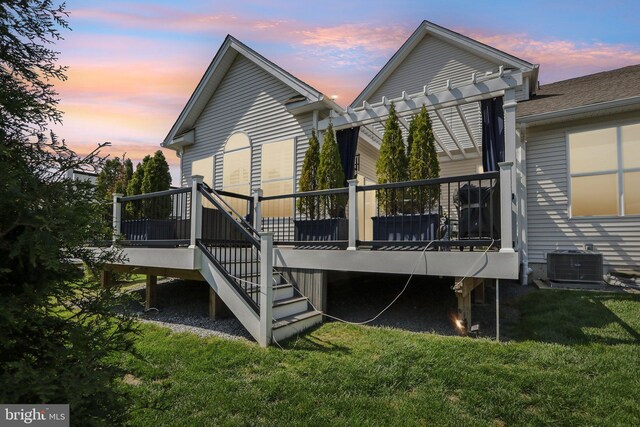 207 Reid Way, West Chester, PA 19382 - back of property with a pergola, a wooden deck, stairway, central air condition unit, and a yard