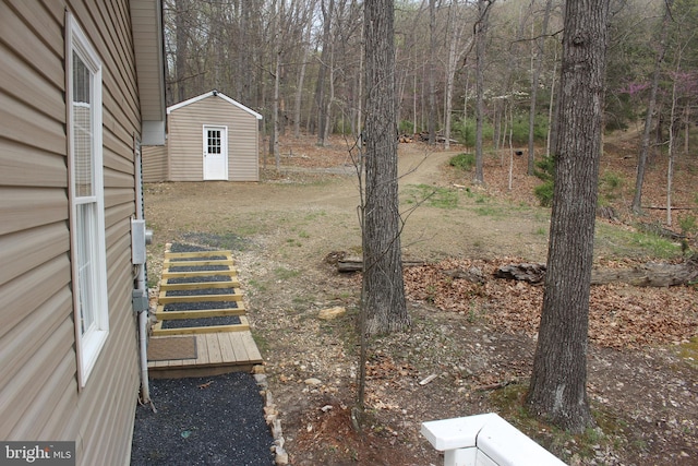 659 Settlers Valley Way, Lost River, WV 26810 - view of yard featuring a view of trees, an outbuilding, and a storage unit