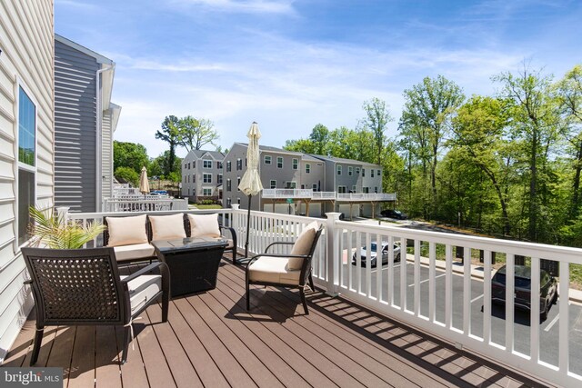 deck with outdoor lounge area