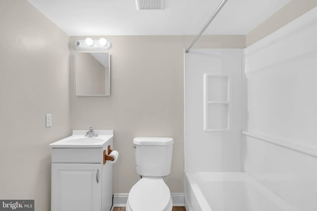 1007 Madison Ct, Annapolis, MD 21403 - bathroom featuring toilet, vanity, washtub / shower combination, and baseboards