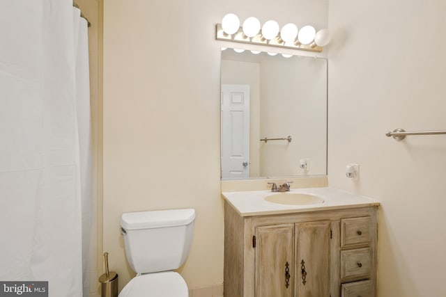 46612 Carriage Ct, Sterling, VA 20164 - bathroom featuring toilet, vanity, and curtained shower
