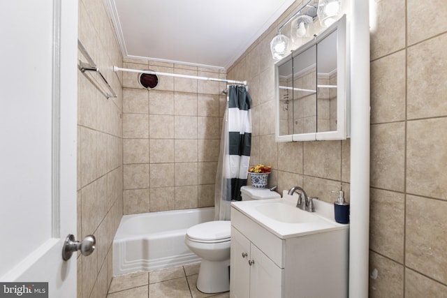 full bathroom featuring vanity, shower / bath combination with curtain, toilet, tile walls, and tile patterned floors
