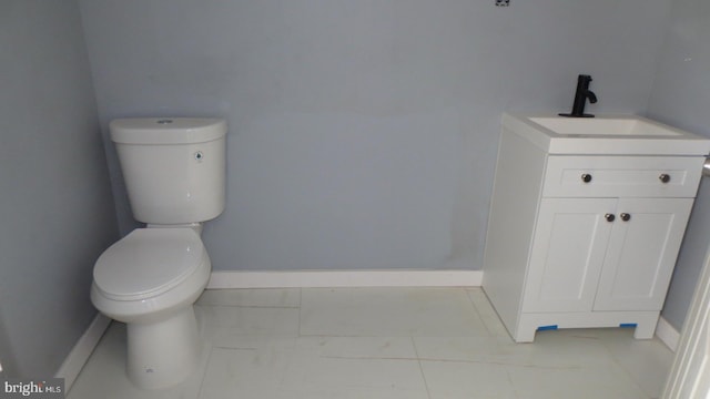 1839 E Pastorius St, Philadelphia, PA 19138 - bathroom featuring baseboards, toilet, and vanity