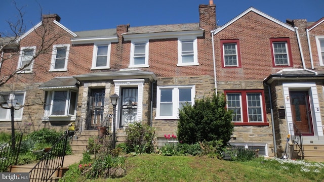 1839 E Pastorius St, Philadelphia, PA 19138 - multi unit property featuring brick siding, stone siding, and a chimney