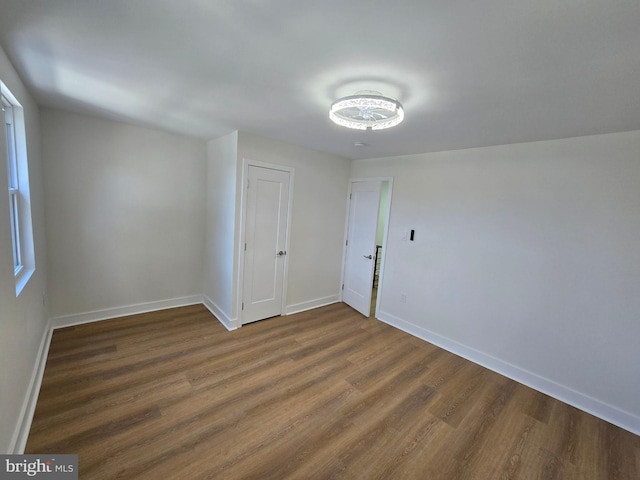 1055 E Cheltenham Ave, Philadelphia, PA 19124 - spare room with wood finished floors and baseboards