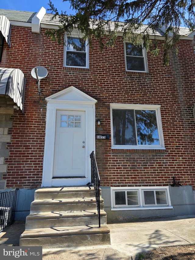 1055 E Cheltenham Ave, Philadelphia, PA 19124 - view of front of house featuring brick siding