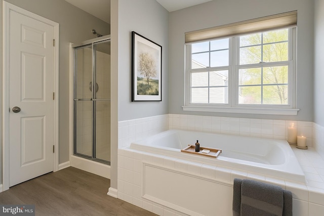 1 Donegal, Newark, DE 19702 - full bathroom with wood finished floors, a shower stall, and a garden tub