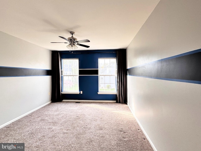 1 Donegal, Newark, DE 19702 - unfurnished room featuring a ceiling fan, baseboards, and carpet floors