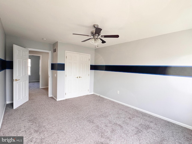 1 Donegal, Newark, DE 19702 - unfurnished bedroom featuring ceiling fan, visible vents, a closet, baseboards, and carpet floors
