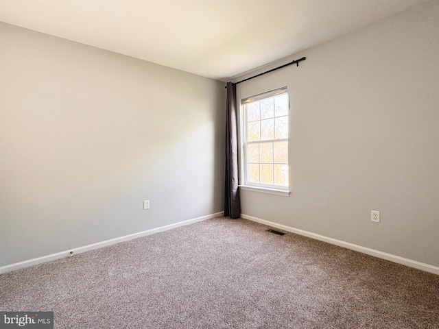 1 Donegal, Newark, DE 19702 - carpeted empty room featuring visible vents and baseboards