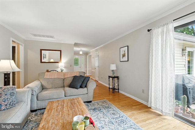206 Barroll Dr, Chestertown, MD 21620 - living area featuring wood finished floors and ornamental molding