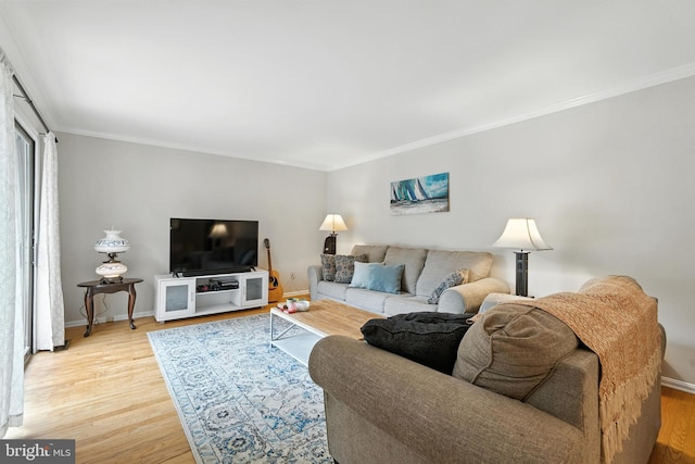 206 Barroll Dr, Chestertown, MD 21620 - living area with crown molding and light wood-style flooring