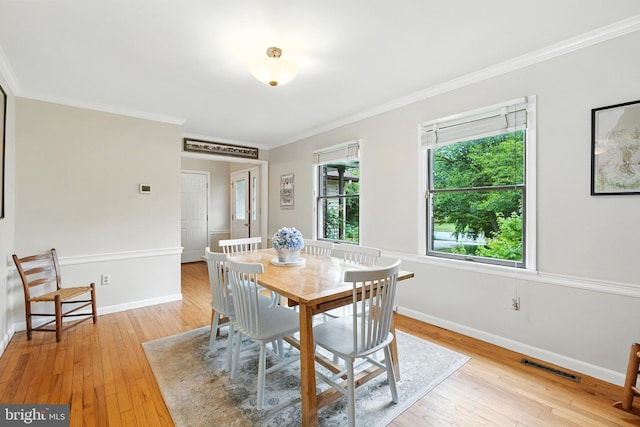 206 Barroll Dr, Chestertown, MD 21620 - dining space with crown molding and light wood finished floors