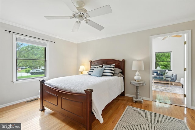 206 Barroll Dr, Chestertown, MD 21620 - bedroom featuring light wood-style floors, crown molding, and ceiling fan
