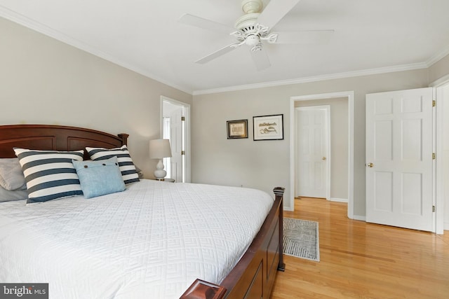 206 Barroll Dr, Chestertown, MD 21620 - bedroom featuring light wood finished floors, ornamental molding, and a ceiling fan