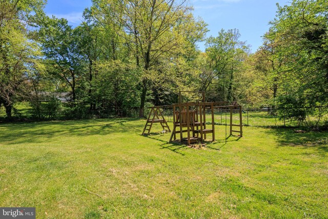 12910 Mayflower Ln, Bowie, MD 20720 - view of yard with fence and a playground