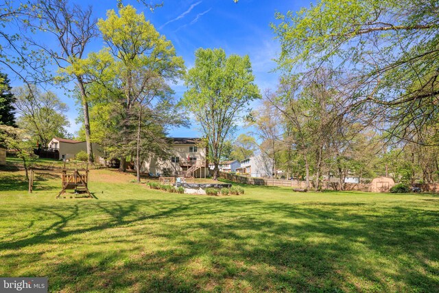 12910 Mayflower Ln, Bowie, MD 20720 - view of yard with fence and stairway