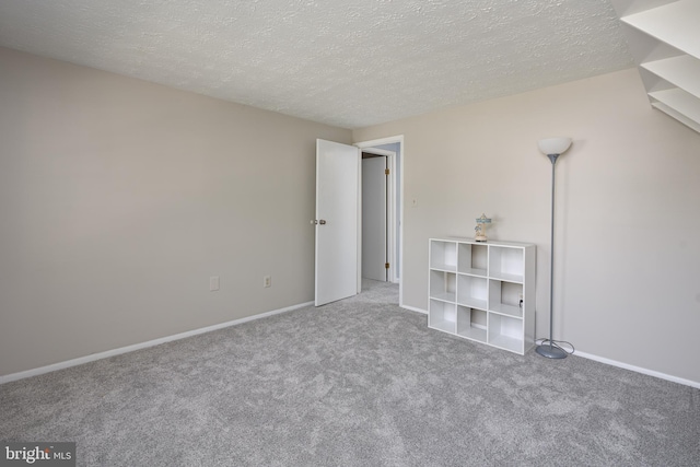 12910 Mayflower Ln, Bowie, MD 20720 - unfurnished room featuring a textured ceiling, carpet, and baseboards