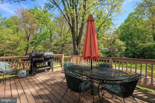 12910 Mayflower Ln, Bowie, MD 20720 - wooden terrace with outdoor dining area and grilling area